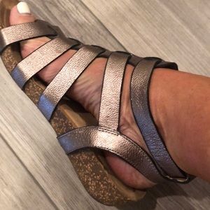 Bronze colored leather gradiator sandals